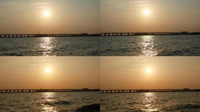 4k海边日落夕阳黄昏 跨海桥梁剪影