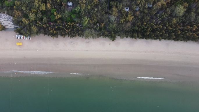 航拍海湾沙滩日出无人机