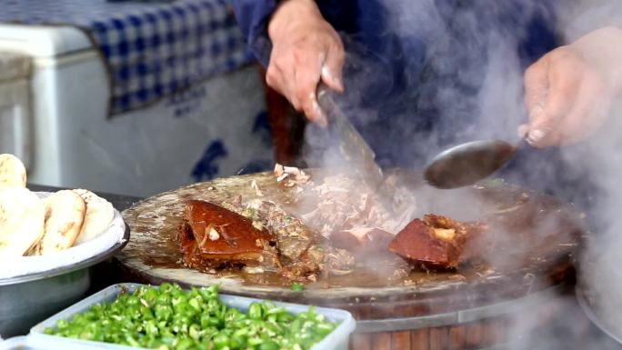 西安肉夹馍打白吉馍剁腊汁肉夹馍镜头