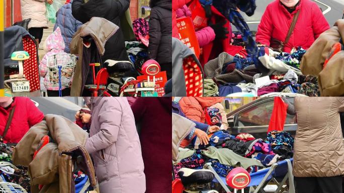 中国传统街头特色集市上处理特价保暖衣服