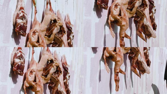 4k过年回家春节前农家挂在墙外的腊肉腊鸡