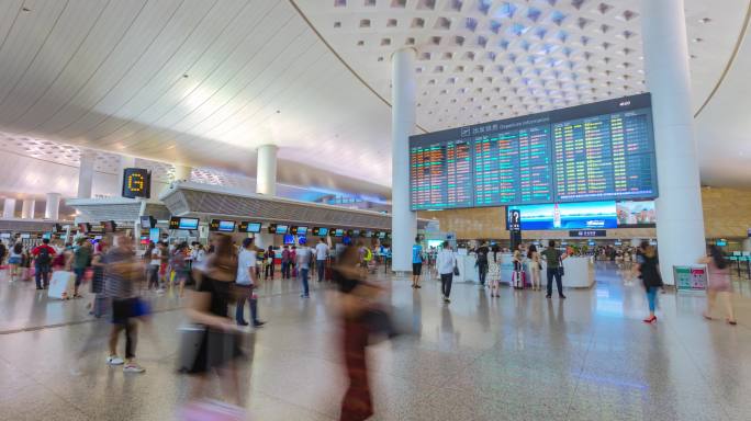 机场候机楼出大厅航班显示器屏人流延时摄影