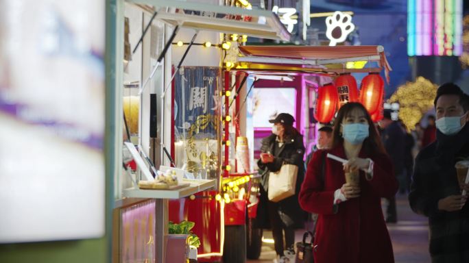 北京春节过年人流冬天街头小吃，商业街