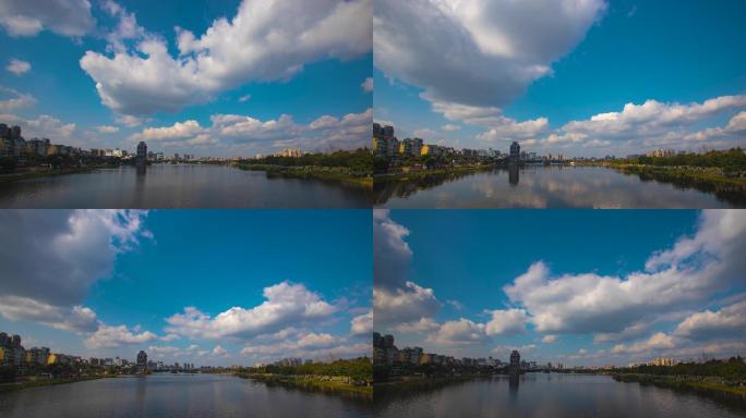 蓝天白下的眉山市东坡湖、远景楼延时视频