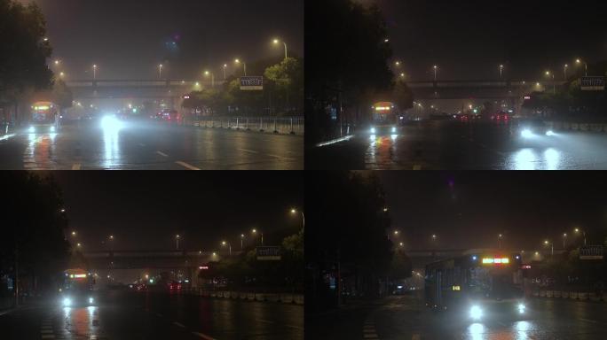 凌晨大雾下的首班公交车