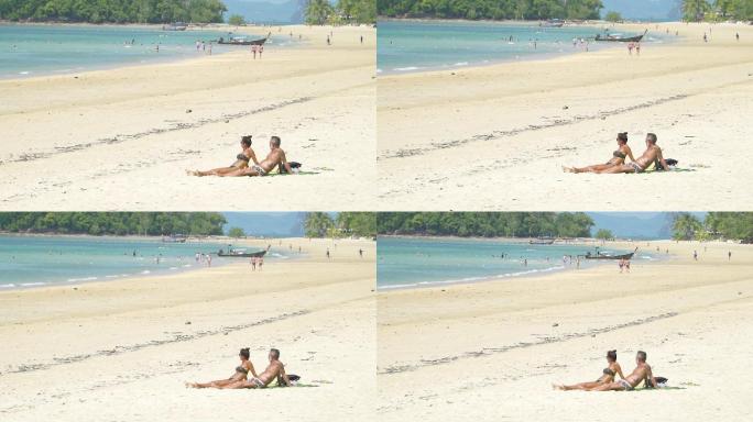 泰国海滩情侣晒太阳