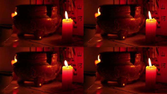 佛龛旁的烛火
