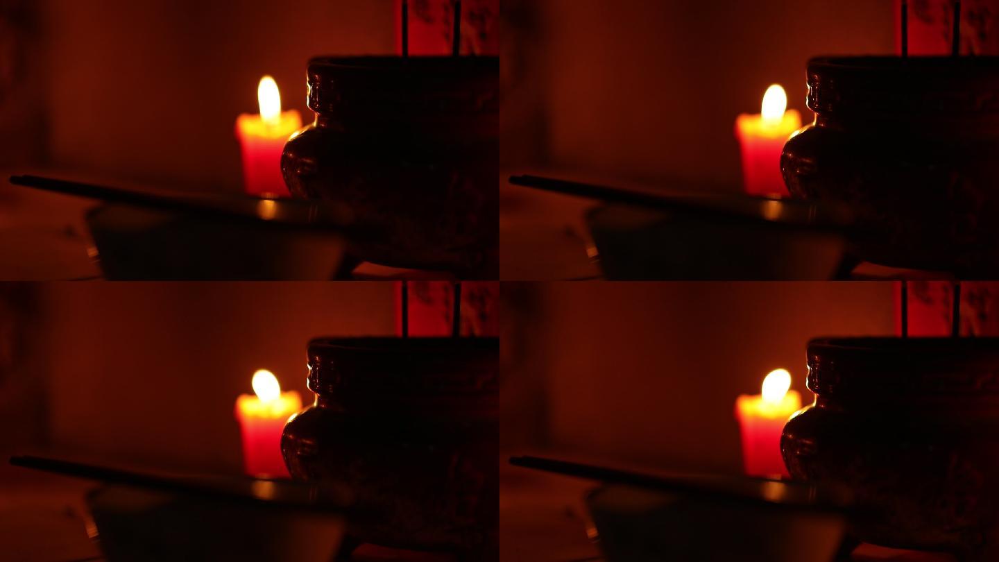香炉红蜡烛跳动的火苗