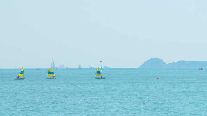 海边帆船轮船冲浪海浪海滩空镜实拍