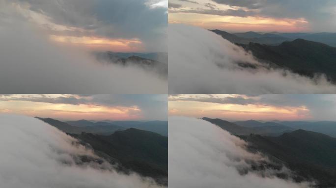 航拍山中日落起雾云海蔓延4K