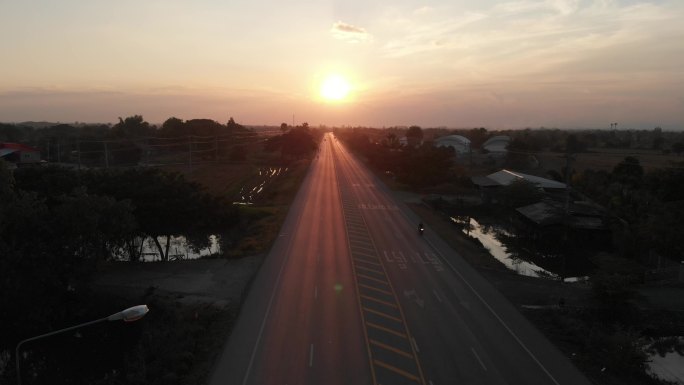 航拍落日平原公路金色大气