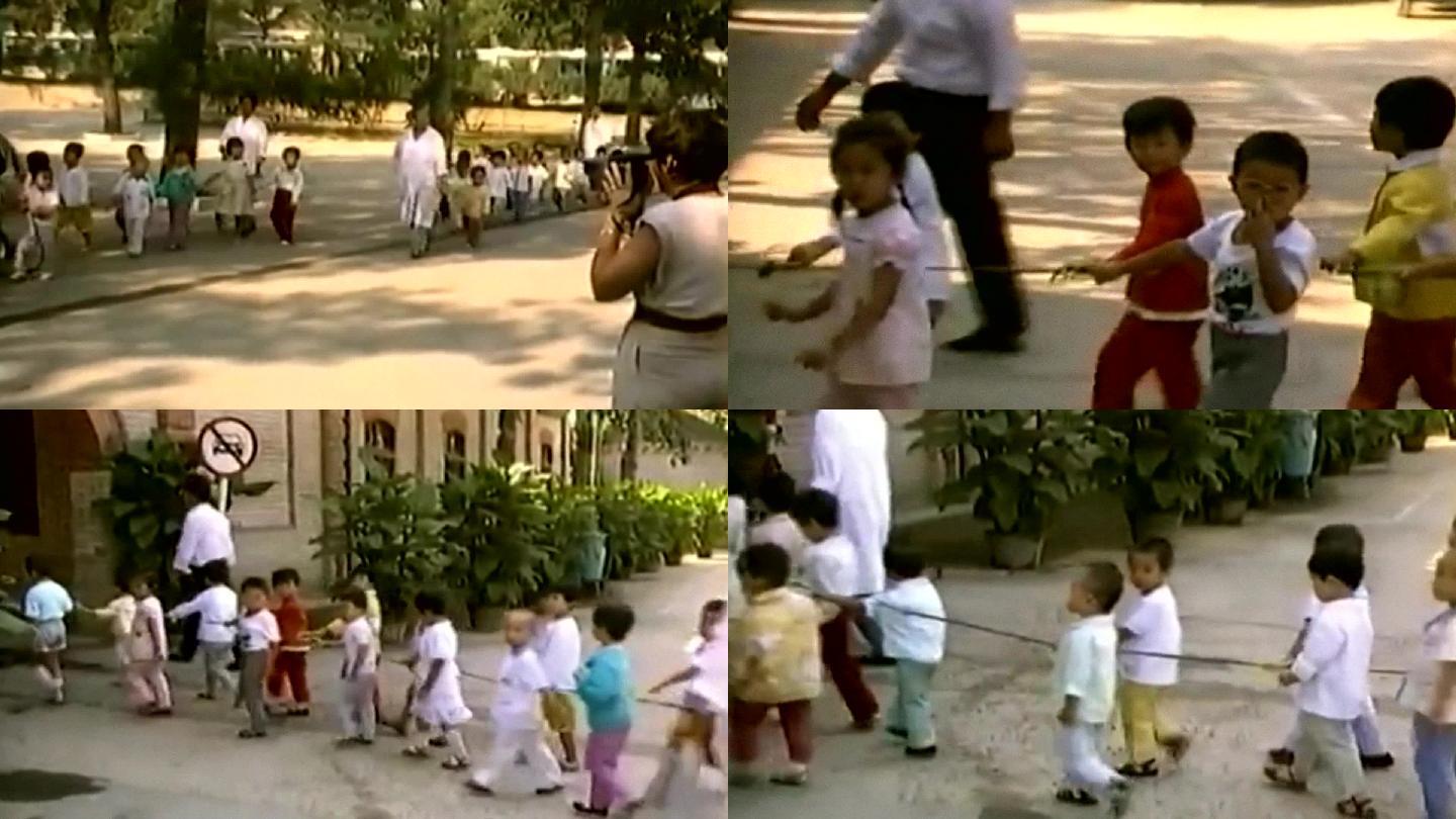 北京学前班幼儿园儿童手拉手过马路散步