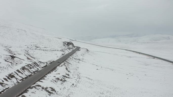 4K雪天青海高原公路自然风光航拍