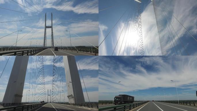 4K航拍大桥蓝天白云,路面行驶原素材
