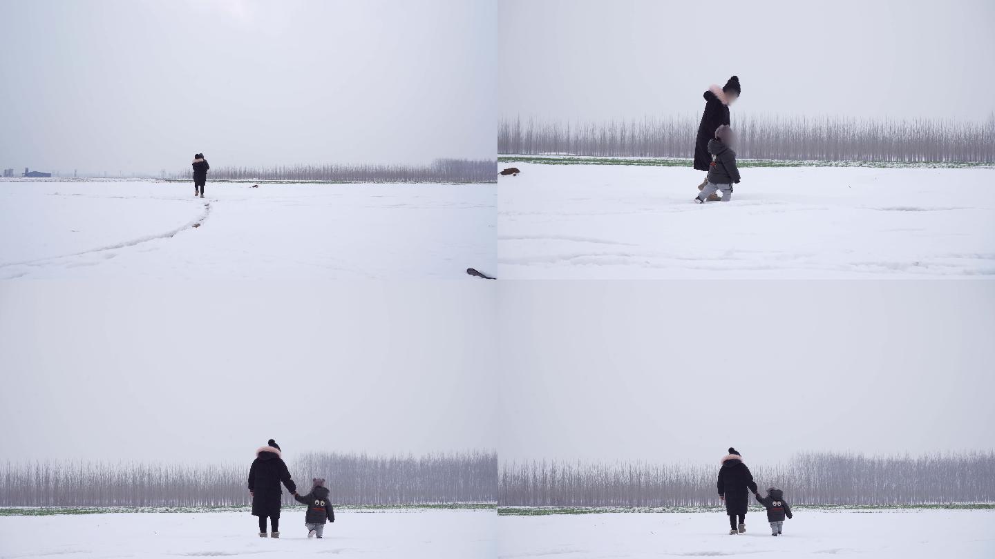 妈妈拉着孩子走在雪地里丨4K丨原创实拍