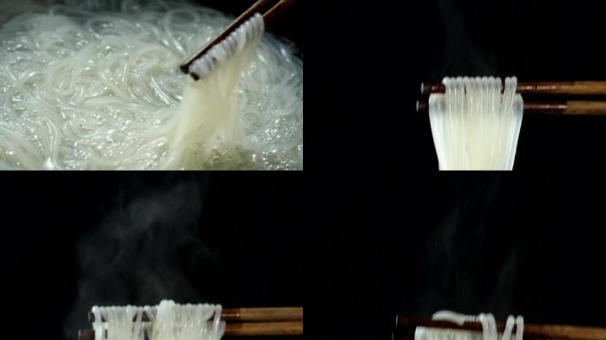 水煮米粉沸腾夹起米粉