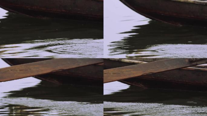 船桨划水摇橹船湖中划水黄昏