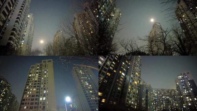 4K城市街道夜景月亮冬天城市夜晚天上月亮