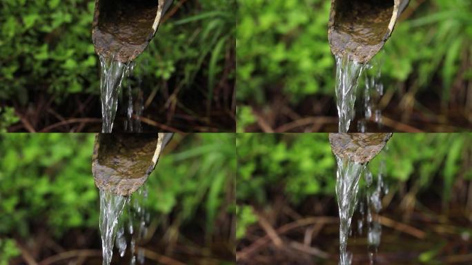 泉水叮咚竹管流出特写空镜（高帧升格）