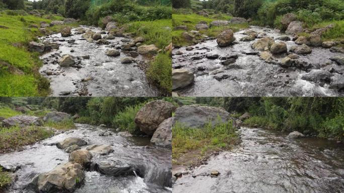 航拍跟踪小溪流水流淌流动