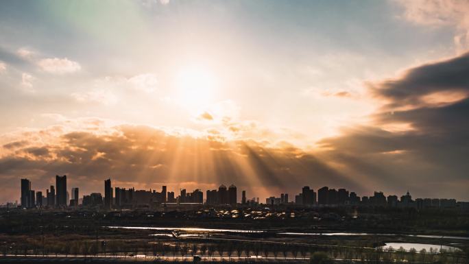 4K哈尔滨城市大景黄昏日落耶稣光延时摄影