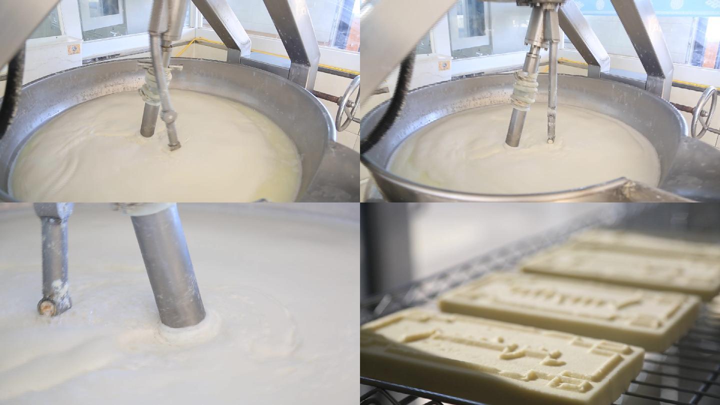 牧民用机器搅拌牛奶制作奶制品奶豆腐