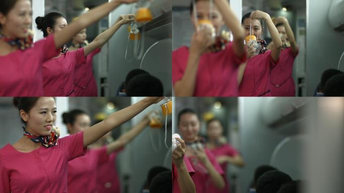 美女空姐向乘客示范氧气罩规范操作