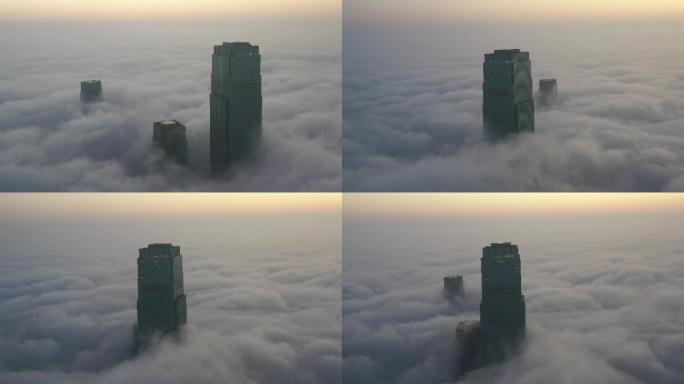 4K航拍云雾中的长沙国金中心日出