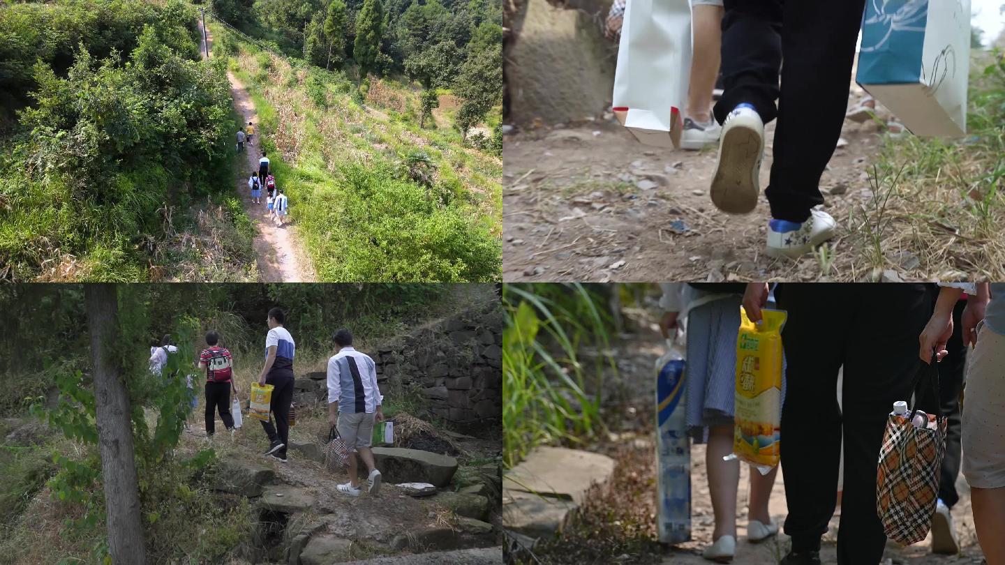 航拍升格基层干部扶贫物步行上山