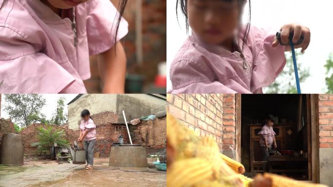山村里的小女孩雨天打水