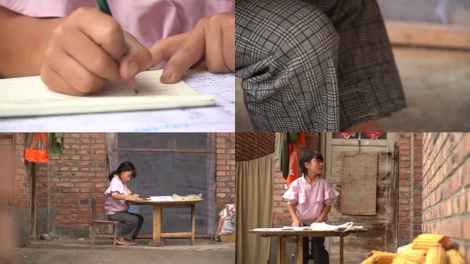 山村里的小女孩雨天写作业