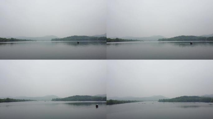 烟雨蒙蒙山湖水船飞向前