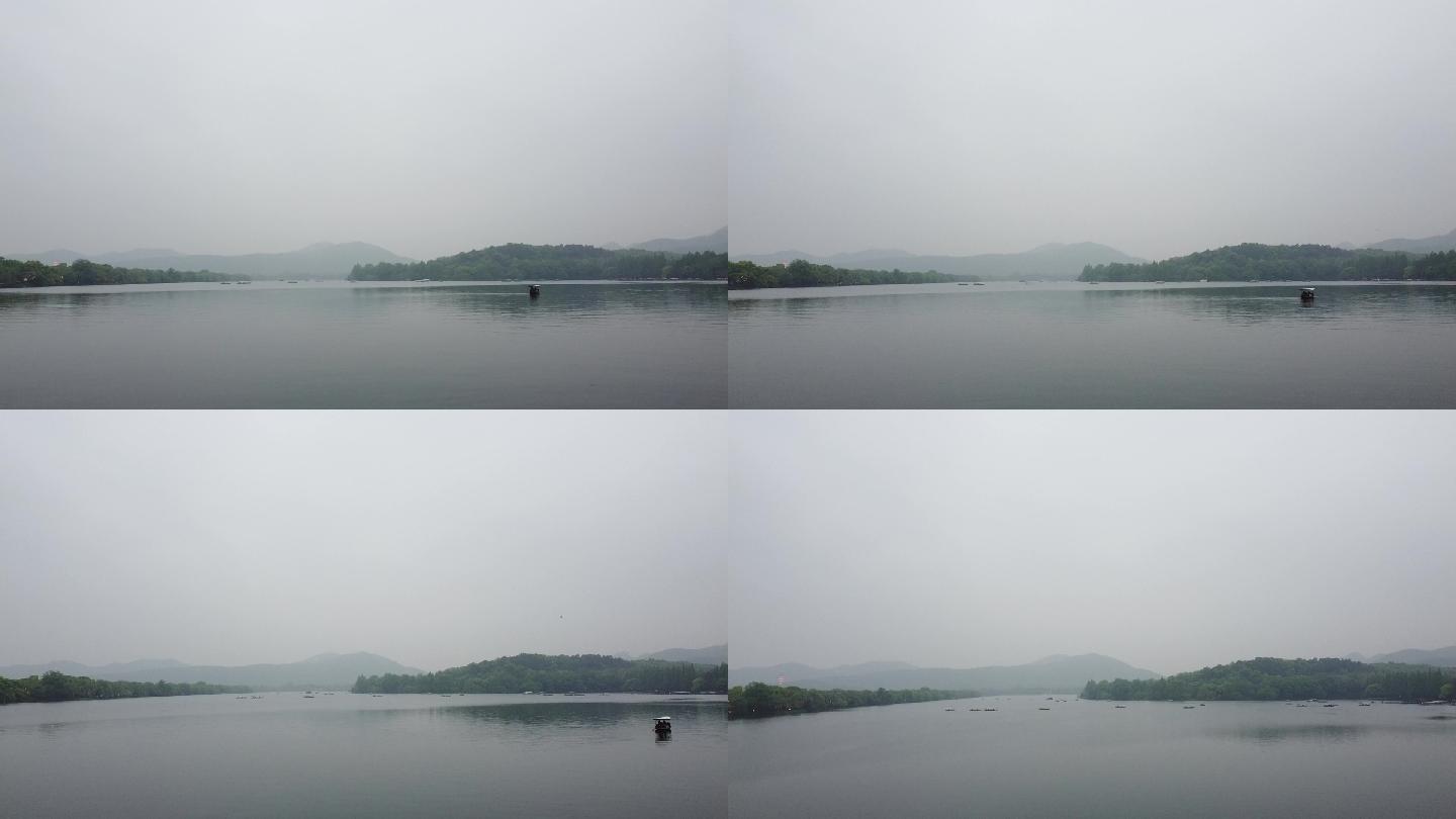 烟雨蒙蒙山湖水船飞向前