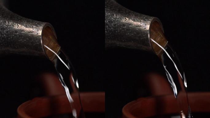 棚拍暗调竖版茶壶茶杯注水镜头
