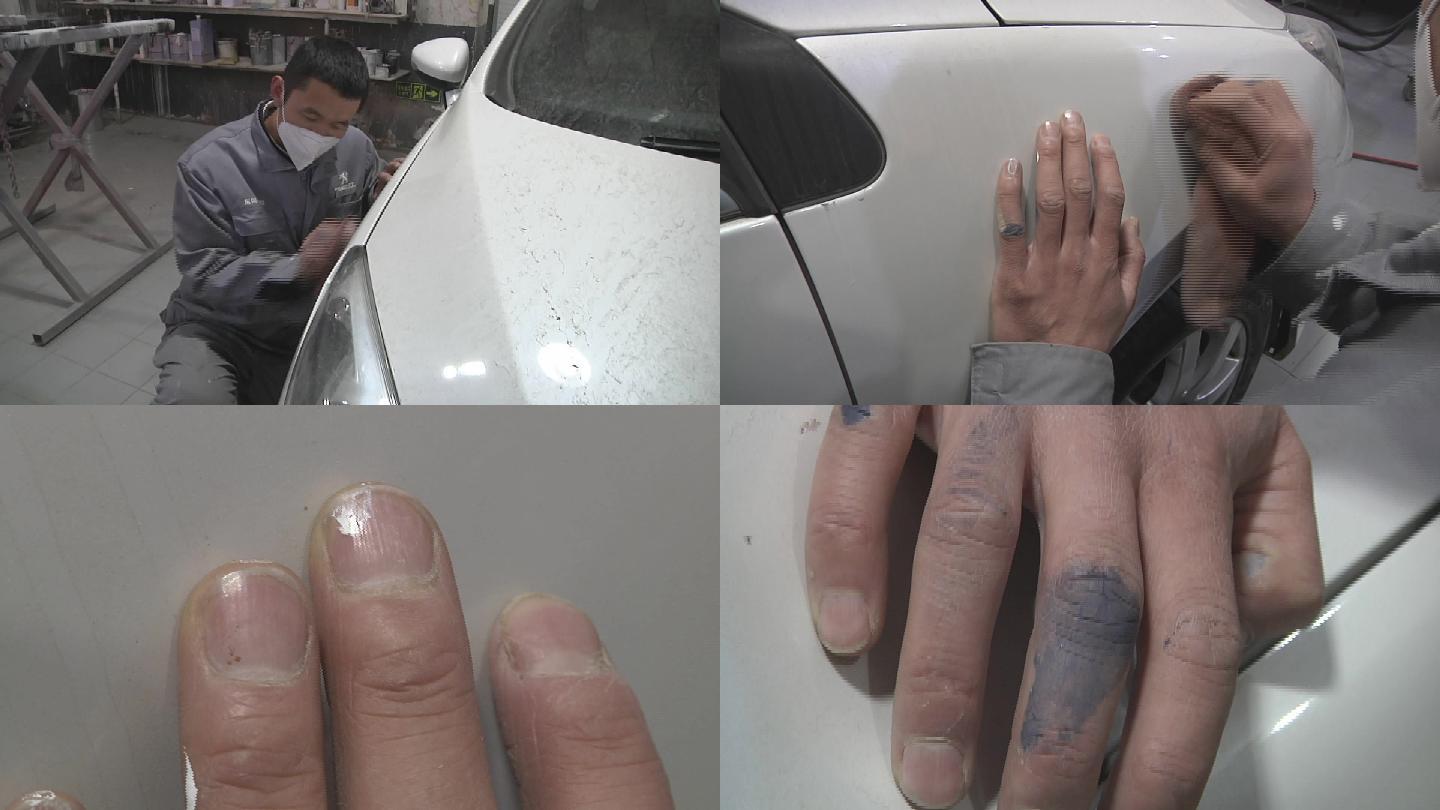 汽车钣金工维修工擦拭喷完漆的汽车