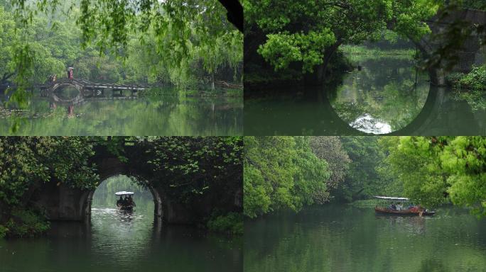 春天西湖园林桥洞手划船唯美雨景