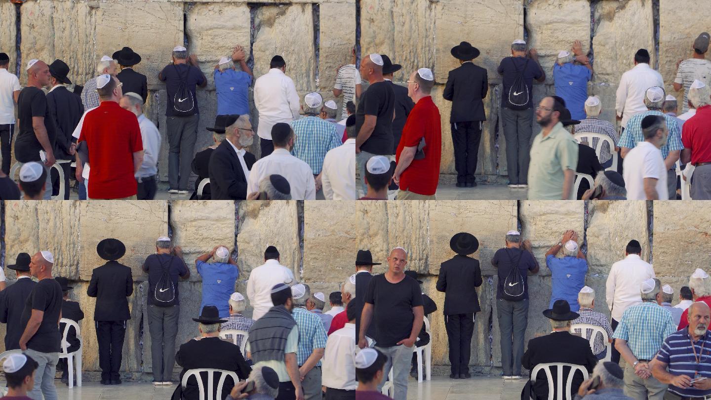以色列耶路撒冷哭墙下祷告的人们