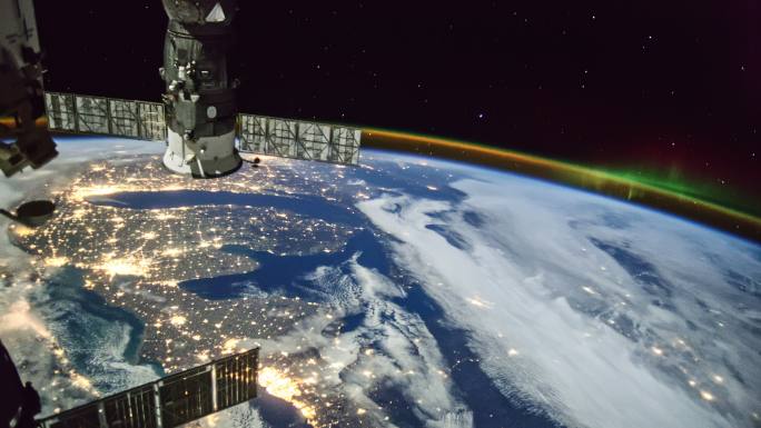 地球上空看极光高角度视图太空旅行车行星空