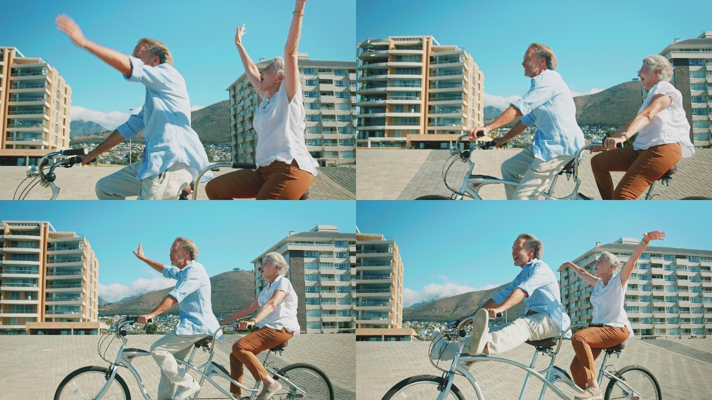 快乐的老年夫妇一起骑双人自行车