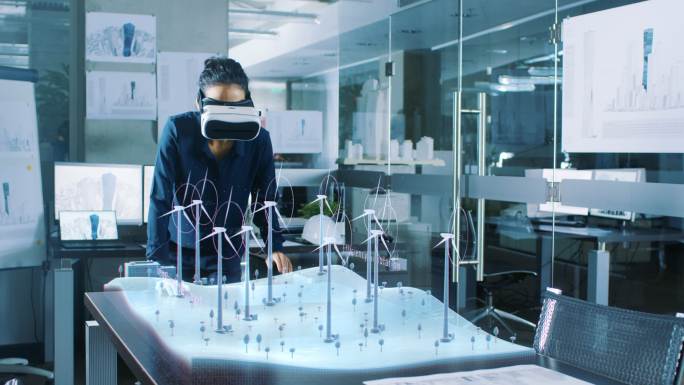 女工程师戴着虚拟现实眼镜