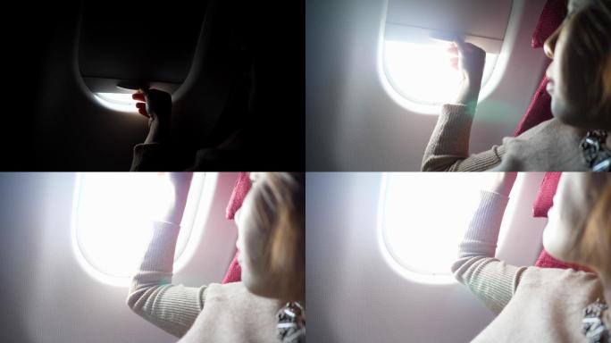 在飞机上打开窗户观景客舱飞行器内部