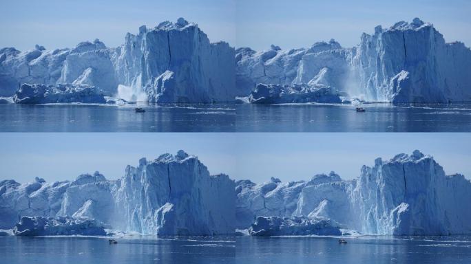 在一艘旅游船前面，一大块冰山掉进了水里