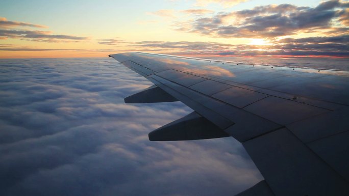 日落飞行飞机上平流云坐飞机