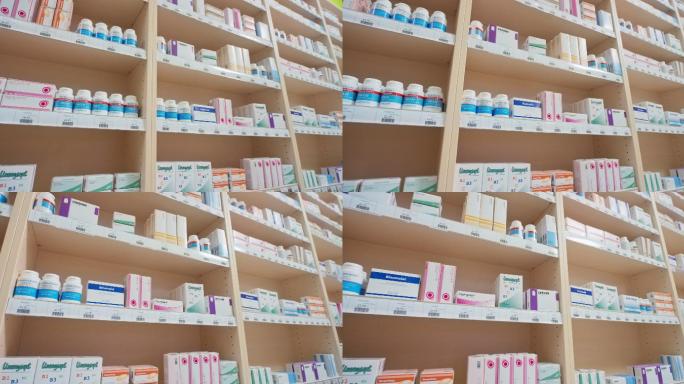 药店的货架上整齐地堆放着药品
