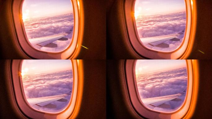 透过飞机窗口欣赏日落