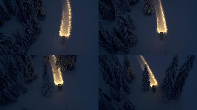 晚上在雪地上开车夜间公路旅行冬季