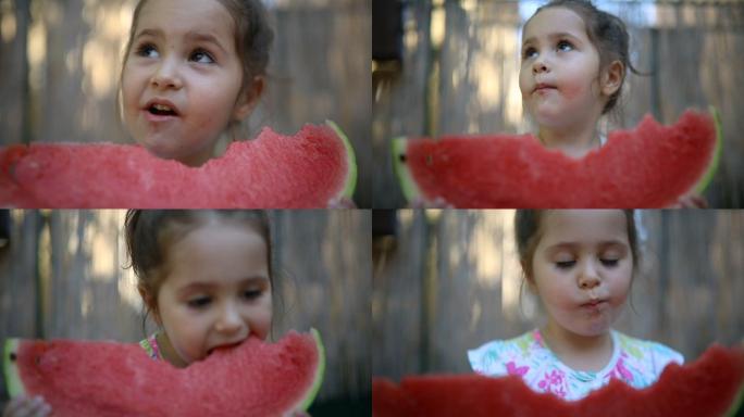 可爱的小孩在吃西瓜