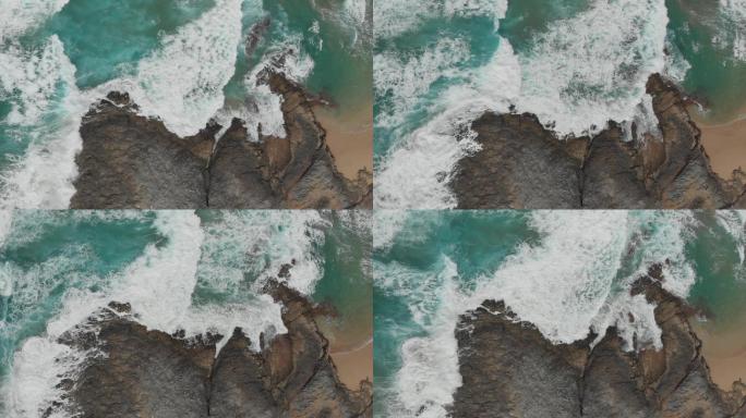 海水岩石海浪拍打海边浪花