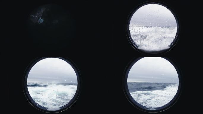 从船的舷窗中看着波涛汹涌的大海