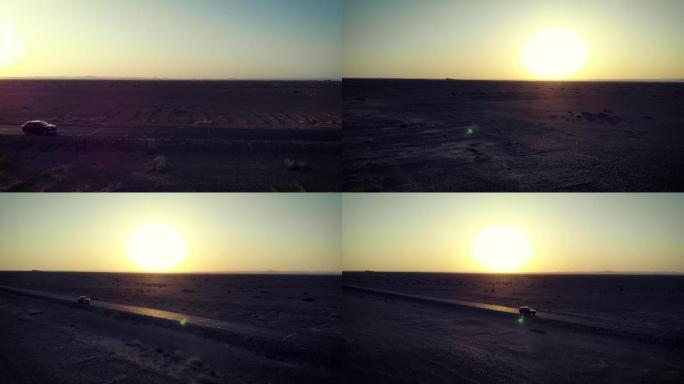 沙漠车航拍夕阳